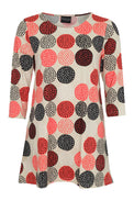 Dress with red and black polka dot pattern on a white background